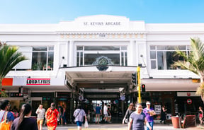 People walking outside St Kevin's Arcade in Auckland.