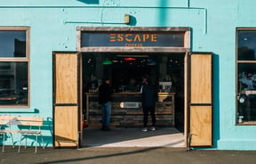 Looking through the doors into Escape Coffee Roasters, New Plymouth.