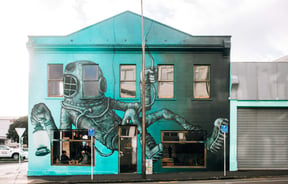 Malarky artwork on the exterior of Escape Coffee Roasters, New Plymouth.