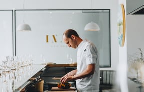 Th chef Simon Levy working in the kitchen inside Inati restaurant Christchurch, New Zealand.