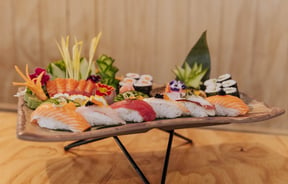 Sushi on plates.