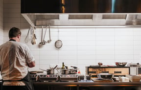 A chef working in the kitchen.