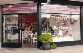 The black and glass exterior of The Cakelady in Ashburton.