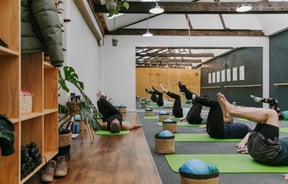 A pilates class in action at Well Studio.