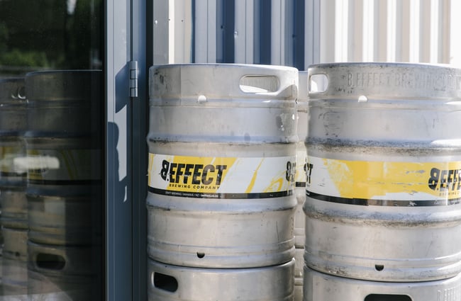 Close up of beer barrels.