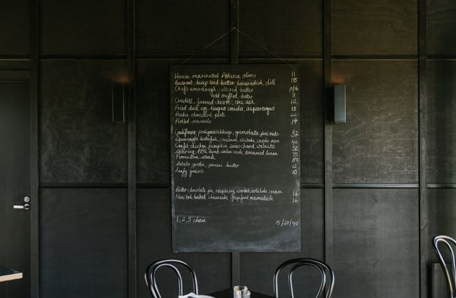 Blackboard menu hanging on the wall at Black Estate, North Canterbury.