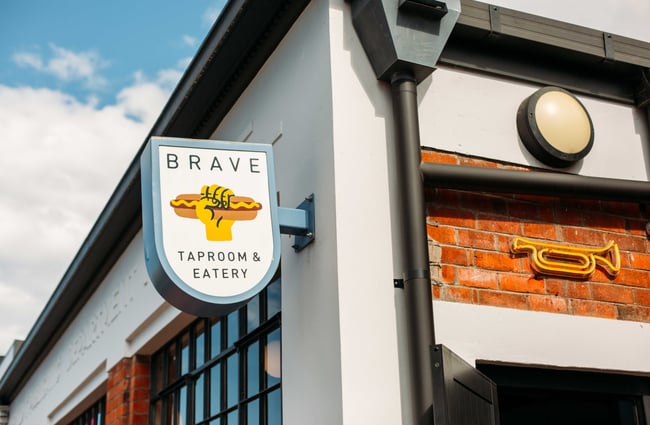 A close up of the Brave Brewing exterior sign.