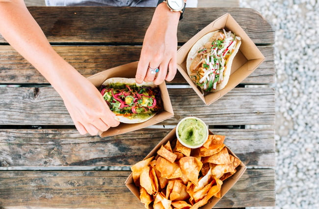 Flatlay of chips and tacos.
