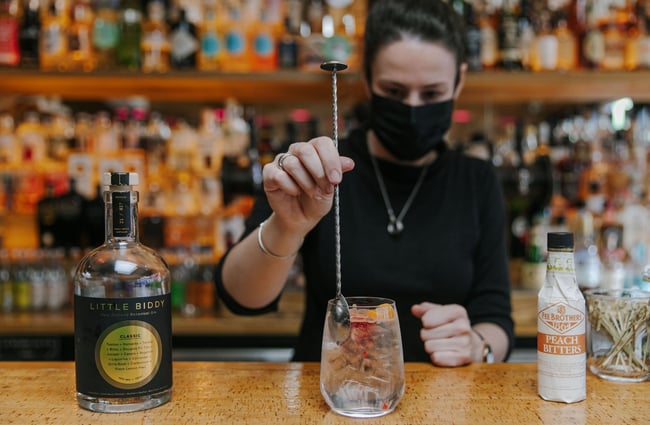 Bartender making a gin cocktail at Cork, Wānaka.