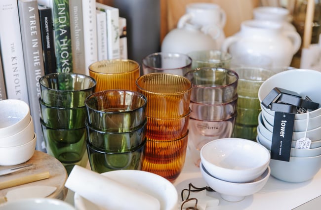 Stacked coloured glass tumblers at Harakeke Florist in Christchurch.