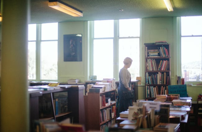 A woman browsing the books.