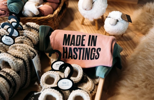 A small item of clothing that says 'made in Hastings'.
