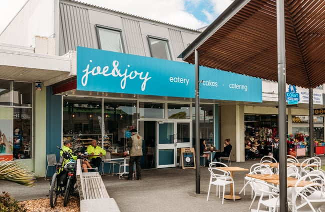 The blue exterior of Joe and Joy cafe in Kapiti.
