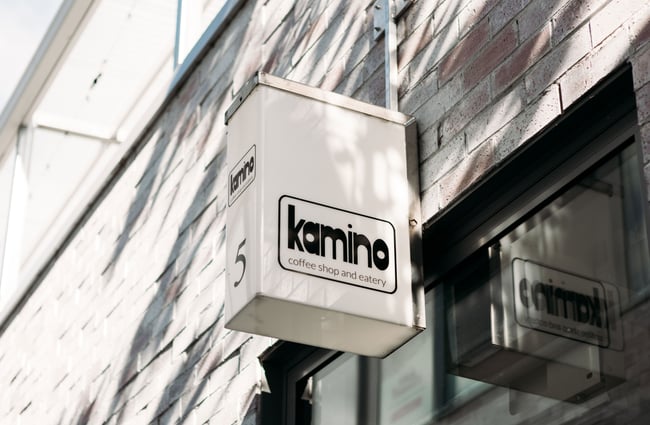 The 'Kamino' sign on a brick wall.