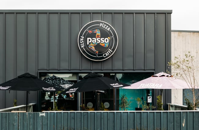 Outdoor seating area outside Passo restaurant.