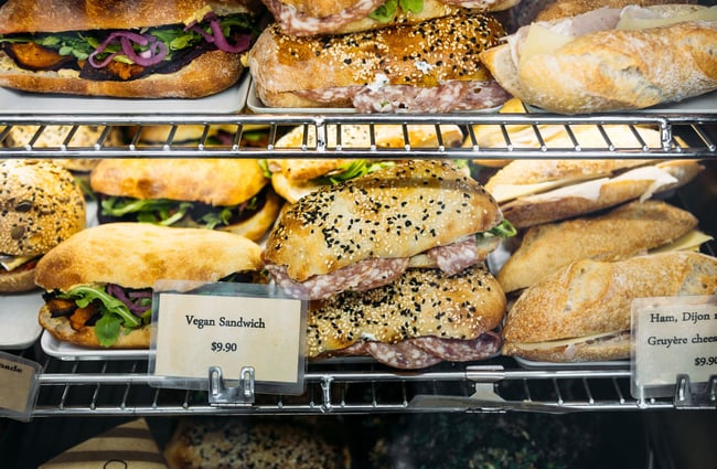 Close up of filled sandwiches in the cabinet at Pembroke Pâtisserie, Wānaka.