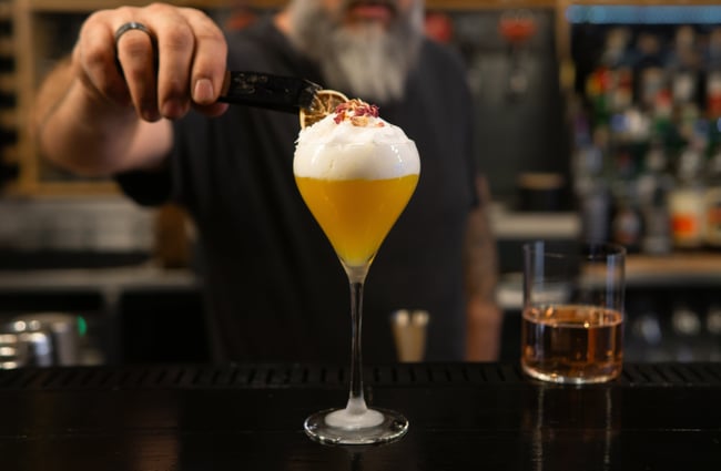 A close up of a cocktail being made at Rascal.