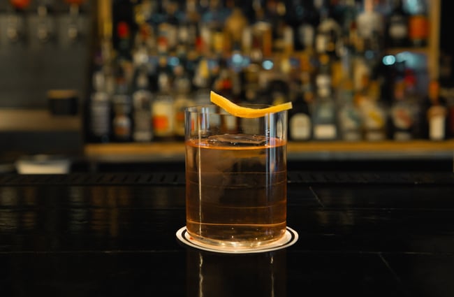 A close up of a cocktail on a table.