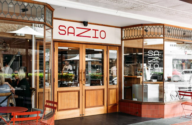 The glass and wood exterior of Sazio in Hastings.