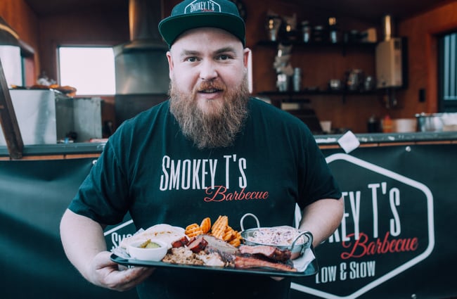 Chef holding platter at Smoky T's, Christchurch.