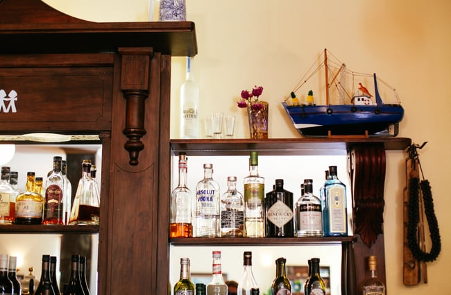 Close up of liquor behind the bar.