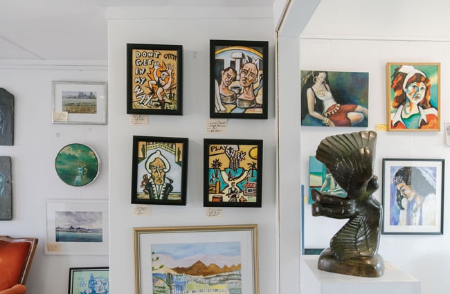 A close up of colourful works of art on a wall inside York Street Gallery in Timaru.