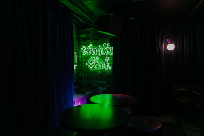 Austin Club green neon sign.