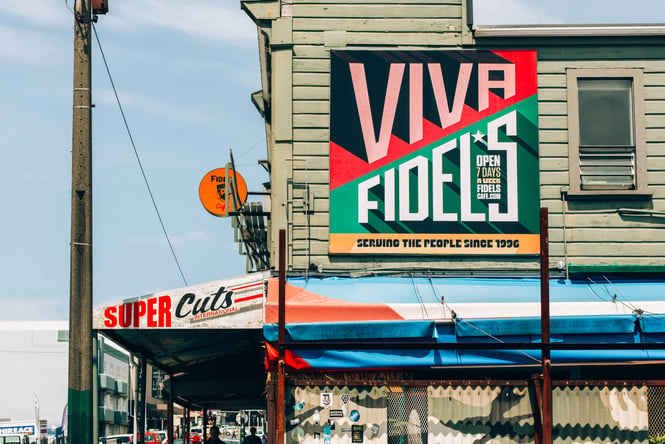 Viva Fidels signage on a villa wall.