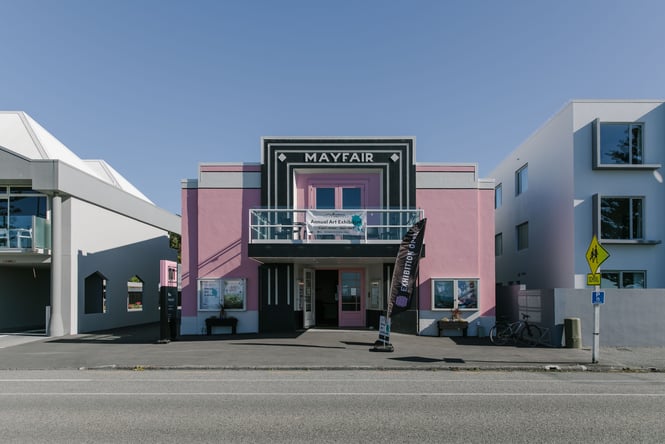 Bright pink exterior of The Mayfair.