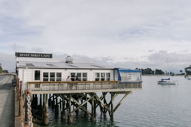 The boat shed cafe on the ocean in Nelson.