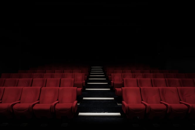 Empty red cinema seats.
