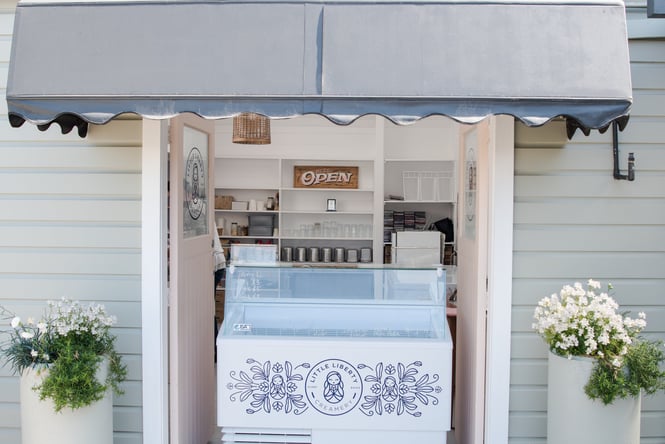 An ice cream fridge sitting in the entrance to Little Liberty.