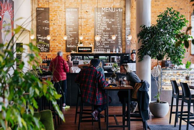 People dining inside Tuatara Café and Bar in Invercargill.