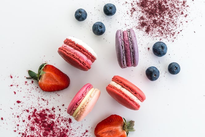 Image of berry macaroons with strawberries and blueberries.