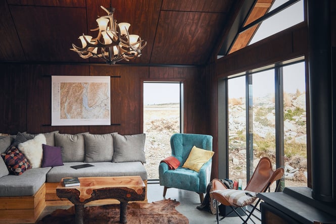 Cozy wooden cabin with fire roaring looking out over Southland high country.