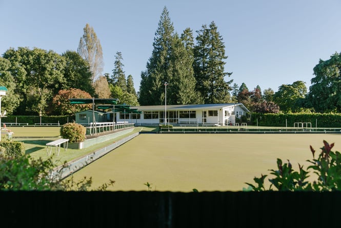 The bowling club at The Ashburton Domain on a sunny day.