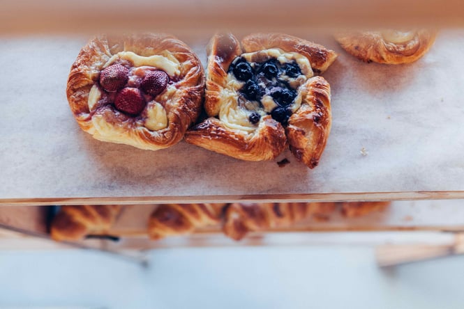 A close up of two fruit pastries.