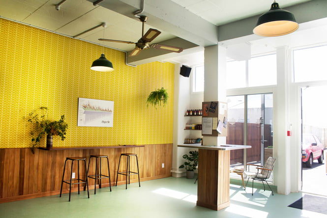 The yellow and green interior of ParrotDog in Wellington.