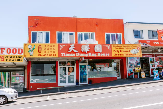 The red and yellow exterior of Tianze restaurant.
