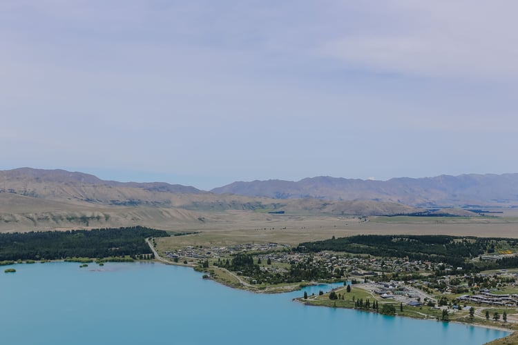 A lake and small township on a sunny day in South Canterbury.