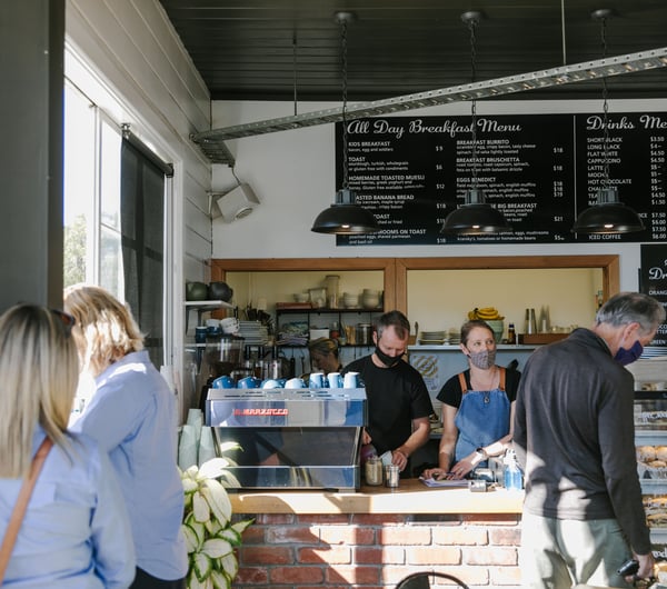 Customers queuing to order at the counter at Little Vintage Espresso in Amberley.