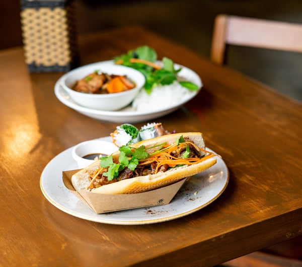 A banh mi on a table.