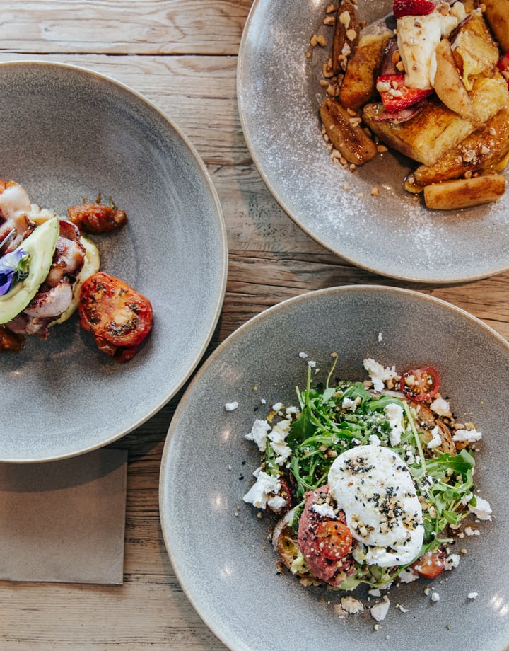 A flatlay of brunch meals on a table at The Batch in Invercargill.