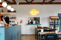 The corner of Brave Brewing which features a shop, kitchen and dining area.