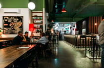 Customers dining inside the large open pace of Giant Brewing in Havelock North.