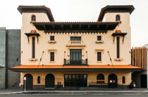 The peachy-orange exterior of the Hastings Municipal Building.