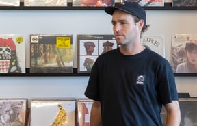 Joel from Holiday Records inside his Auckland CBD store.
