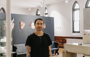 Naith Morrow inside Absolution Tattoo