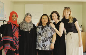 A photo of Elisha Watson with her team.