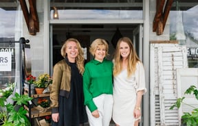 Anna Begg of the Workroom Caravan with two other women.